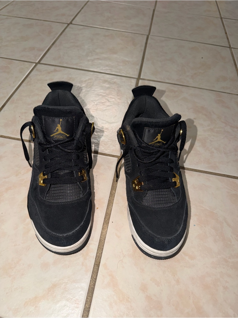Nike Air Jordan 4 Retro Men's Black with Gold Accents